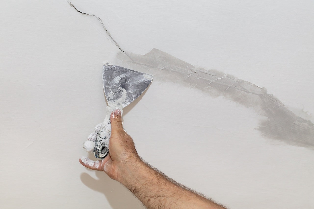 fissures-masquees-peintures-vices-caches-btgexpertises-expertise-batiment